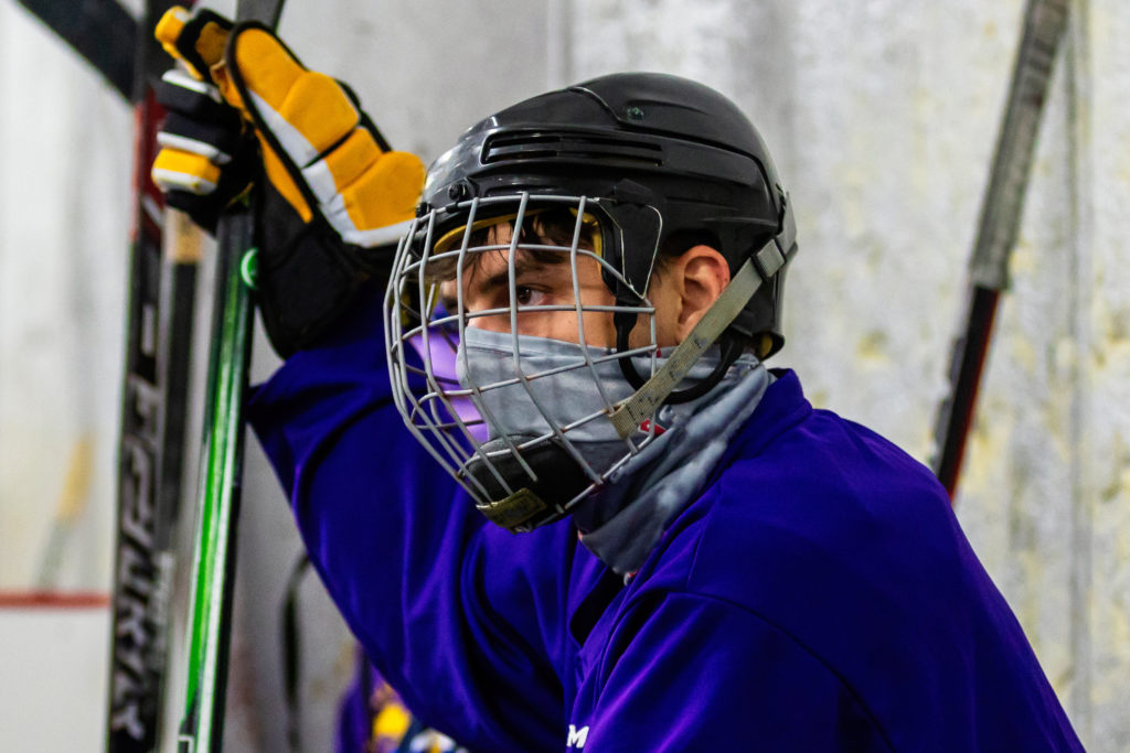 hockey player in coronavirus face mask
